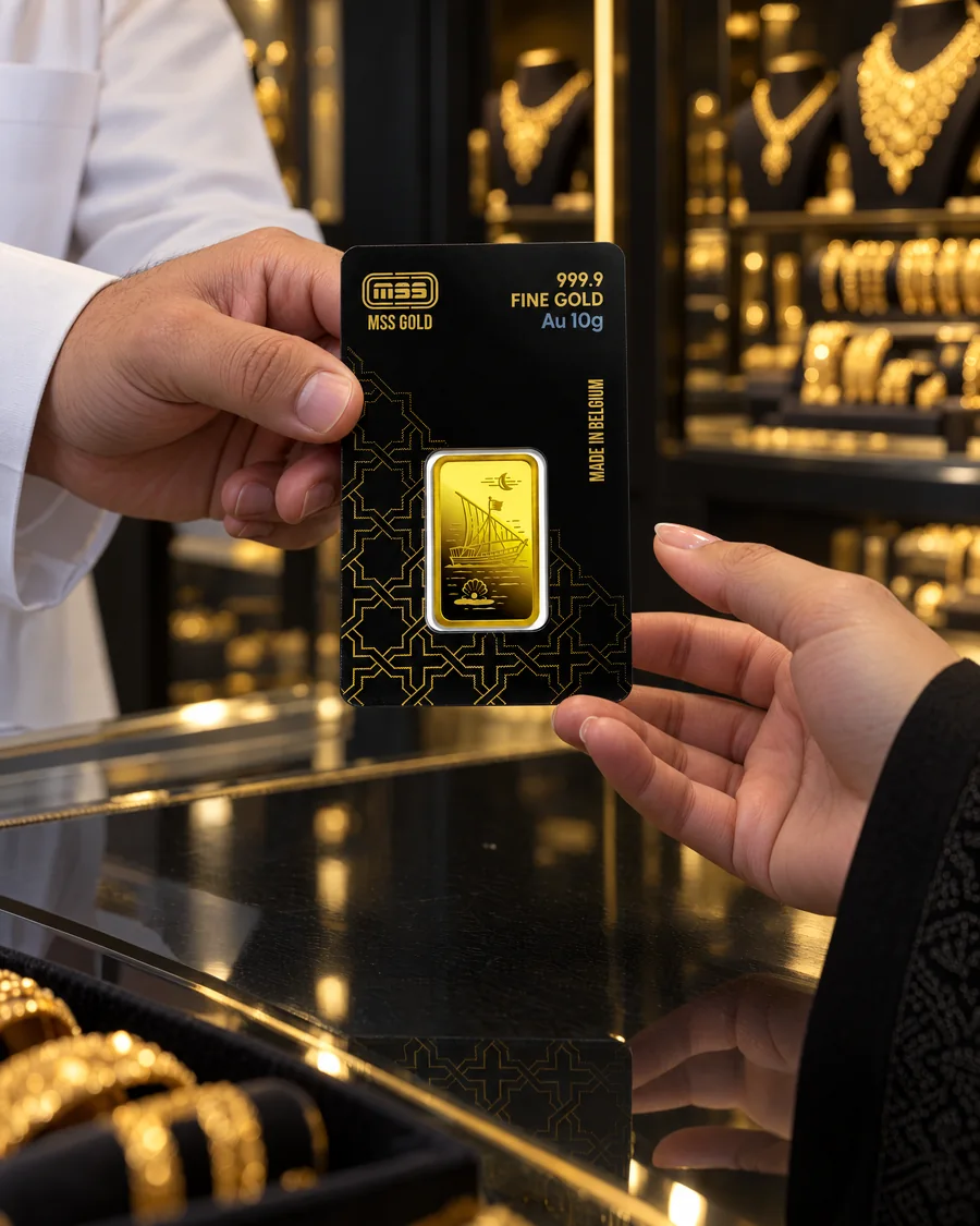 An MSS Gold 10 g bar in its sealed card, handed over at the gold counter